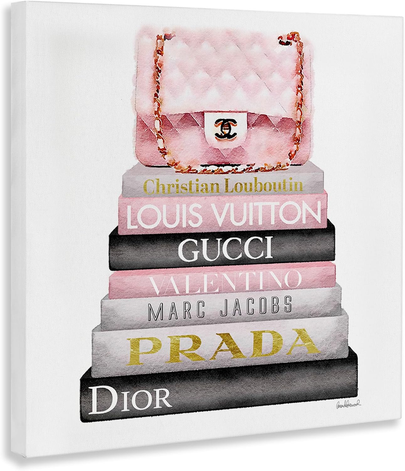 The Stupell Home Décor Collection Watercolor High Fashion Bookstack styled on a wall at home